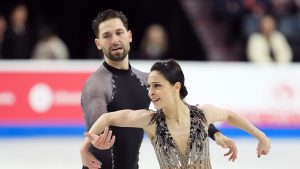 Deanna Stellato-Dudek and Maxime Deschamps of Canada compete in the pairs short program at the Skate Canada International figure skating competition in Halifax, Friday, Oct. 25, 2024. (Darren Calabrese/CP)