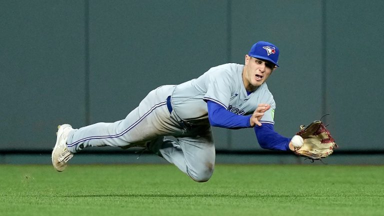 Toronto Blue Jays left fielder Daulton Varsho catches a fly ball for the out on Kansas City Royals shortstop Bobby Witt Jr. during the seventh inning of a baseball game Wednesday, April 24, 2024, in Kansas City, Mo. (Charlie Riedel/AP)