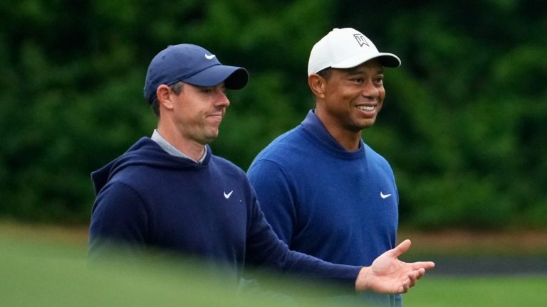 Rory McIlroy, of Northern Ireland, and Tiger Woods walk on the 11th fairway during a practice for the Masters golf tournament at Augusta National Golf Club, Monday, April 3, 2023, in Augusta, Ga. (Matt Slocum/AP Photo)