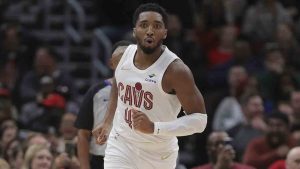 Cleveland Cavaliers guard Donovan Mitchell reacts after making a spinning layup during an NBA basketball game against the Chicago Bulls, Monday, Nov. 11, 2024, in Chicago. (Melissa Tamez/AP)