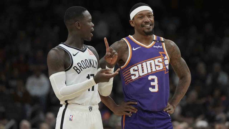 Brooklyn Nets guard Dennis Schroder and Phoenix Suns guard Bradley Beal (3) talk during the second half of an NBA basketball game, Wednesday, Nov. 27, 2024, in Phoenix. Brooklyn won 127-117. (Rick Scuteri/AP)