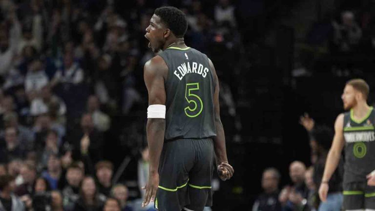 Minnesota Timberwolves guard Anthony Edwards (5) reacts after making a 3-point shot during the first half of an NBA basketball game against the Denver Nuggets, Friday, Nov. 1, 2024, in Minneapolis. (Abbie Parr/AP)