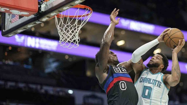 Charlotte Hornets forward Miles Bridges (0) drives to the basket against Detroit Pistons centre Jalen Duren (0) during the first half of an NBA basketball game, Wednesday, Nov. 6, 2024, in Charlotte, N.C. (Matt Kelley/AP)