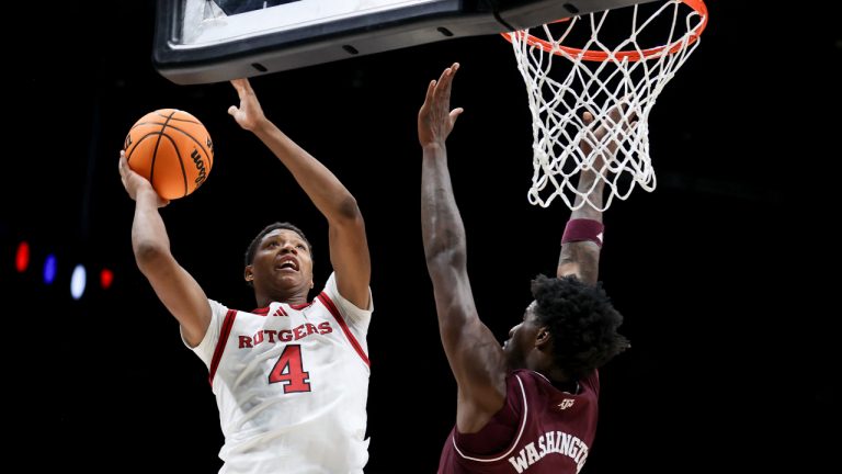 Rutgers guard Ace Bailey (4) shoots against Texas A&M forward Solomon Washington (9) during the first half of an NCAA college basketball game. (Ian Maule/AP)