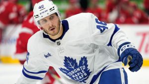 Toronto Maple Leafs center Alex Steeves (46) plays against the Detroit Red Wings in the second period of a preseason NHL hockey game. (AP Photo/Paul Sancya)