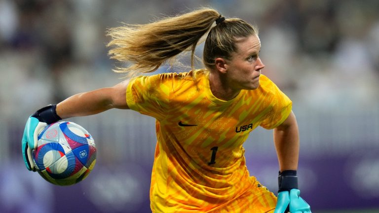 United States goalkeeper Alyssa Naeher serves the ball to a teammate during a women's group B match between the United States and Zambia at Nice Stadium at the 2024 Summer Olympics, Thursday, July 25, 2024, in Nice, France. The U.S. won 3-0. (Julio Cortez/AP)