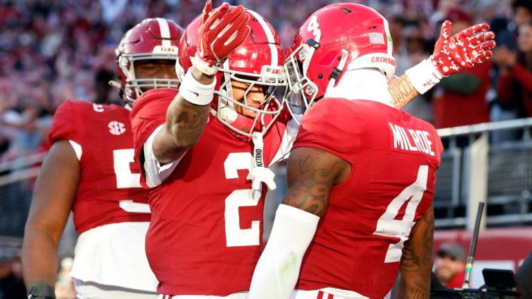 Alabama wide receiver Ryan Williams (2) celebrates with quarterback Jalen Milroe (4) after a touchdown against Auburn during the first half of an NCAA college football game, Saturday, Nov. 30, 2024, in Tuscaloosa, Ala. (Butch Dill/AP)