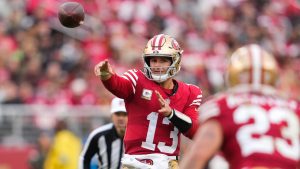 San Francisco 49ers quarterback Brock Purdy passes to running back Christian McCaffrey during an NFL game against the Seattle Seahawks, Sunday, Nov. 17, 2024, in Santa Clara, Calif. (AP/Godofredo A. Vásquez)