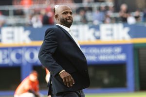 Former Cleveland Indians pitcher C.C. Sabathia throws a ceremonial first pitch after his induction into the Cleveland Guardians Hall of Fame before a Cleveland Guardians Baltimore Orioles baseball game in Cleveland, Saturday, Aug. 3, 2024. (AP/Phil Long)