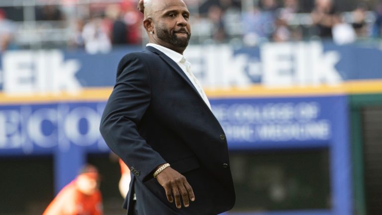 Former Cleveland Indians pitcher C.C. Sabathia throws a ceremonial first pitch after his induction into the Cleveland Guardians Hall of Fame before a Cleveland Guardians Baltimore Orioles baseball game in Cleveland, Saturday, Aug. 3, 2024. (AP/Phil Long)