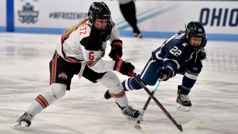 Ohio State's Hadley Hartmetz (6) and Yale's Anna Bargman (22) battle for the puck. (AP Photo/Gary M. Baranec)