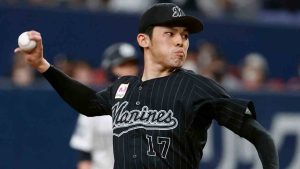 Chiba Lotte Marines Roki Sasaki pitches during a game against the Orix Buffaloes in Osaka, western Japan, Sunday, April 24, 2022. (Kyodo News via AP)