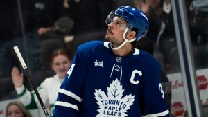 Toronto Maple Leafs captainAuston Matthews looks to the crowd after scoring against the Ottawa Senators during third period NHL pre-season hockey action in Toronto, on Sunday, September 22, 2024. (Paige Taylor White/CP)