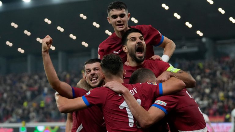 Serbia's players celebrate after a goal during the UEFA Nations League soccer match between Serbia and Switzerland at the Dubocica Stadium in Leskovac, Serbia, Saturday, Oct. 12, 2024. (Darko Vojinovic/AP) 