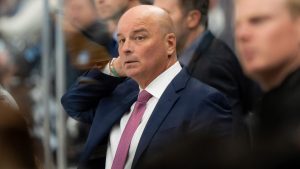 Former Bruins head coach Jim Montgomery watches the action during the second period of an NHL hockey game against the Utah Hockey Club, Saturday, Oct. 19, 2024, in Salt Lake City. (Spenser Heaps/AP) 