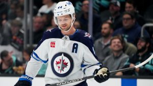 Winnipeg Jets defenceman Josh Morrissey looks down during the first period of an NHL hockey game against the Seattle Kraken, Thursday, Oct. 24, 2024, in Seattle. (AP)