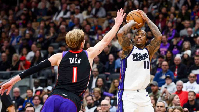 Sacramento Kings forward DeMar DeRozan (10) attempts a three-pointer while defended by Toronto Raptors guard Gradey Dick (1) during second half NBA action, in Toronto on Saturday, November 2, 2024. (Christopher Katsarov/CP)