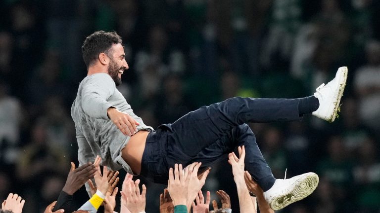 Sporting players throw head coach Ruben Amorim in the air at the end of the Champions League opening phase soccer match between Sporting CP and Manchester City at the Alvalade stadium in Lisbon, Tuesday, Nov. 5, 2024. (Armando Franca/AP)