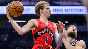 Toronto Raptors guard Gradey Dick (1) drives to the basket over Sacramento Kings forward Domantas Sabonis during the first half of an NBA basketball game in Sacramento, Calif., Wednesday, Nov. 6, 2024. (Randall Benton/AP)