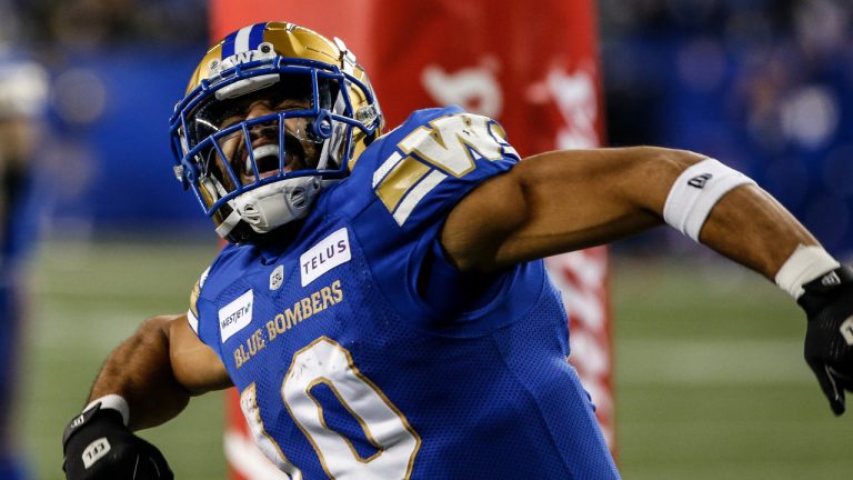 Winnipeg Blue Bombers' Nic Demski (10) celebrates his touchdown against the Saskatchewan Roughriders during the first half of CFL Western Conference Final action in Winnipeg Saturday, November 9, 2024. (John Woods/CP)