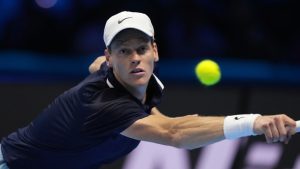 Italy's Jannik Sinner returns the ball to United States' Taylor Fritz during their singles tennis match of the ATP World Tour Finals at the Inalpi Arena, in Turin, Italy, Tuesday, Nov. 12, 2024. (Antonio Calanni/AP)