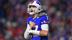 Buffalo Bills quarterback Josh Allen (17) reacts after scoring during the second half of an NFL football game against the Kansas City Chiefs in Orchard Park, N.Y., Sunday, Nov. 17, 2024. (Adrian Kraus/AP)