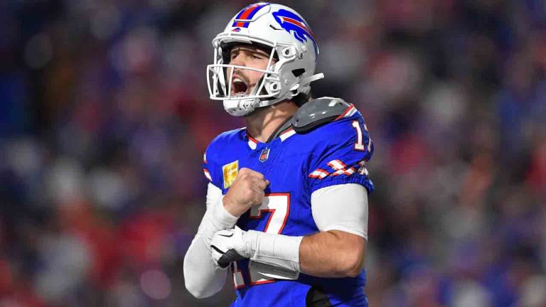 Buffalo Bills quarterback Josh Allen (17) reacts after scoring during the second half of an NFL football game against the Kansas City Chiefs in Orchard Park, N.Y., Sunday, Nov. 17, 2024. (Adrian Kraus/AP)