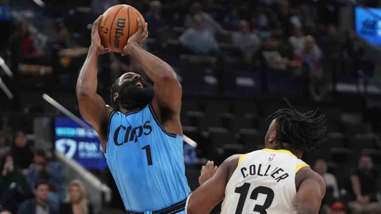 Los Angeles Clippers guard James Harden, left, shoots as Utah Jazz guard Isaiah Collier defends during the first half of an NBA basketball game, Sunday, Nov. 17, 2024, in Inglewood, Calif. (Mark J. Terrill/AP)