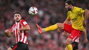 Athletic Bilbao's Aitor Paredes fights for the ball against Elfsborg's Arber Zeneli during the Europa League opening phase soccer match between Athletic Bilbao and Elfsborg at the San Mames stadium in Bilbao, Spain, Thursday, Nov. 28, 2024. (Miguel Oses/AP) 