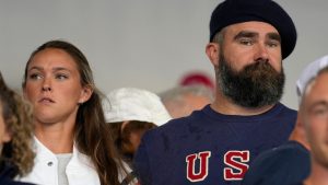 Recently retired Philadelphia Eagles lineman Jason Kelce and wife, Kylie, watch the women's field hockey match between the Argentina and United States, at the Yves-du-Manoir Stadium, at the 2024 Summer Olympics, Saturday, July 27, 2024, in Colombes, France. (Anjum Naveed/AP) 