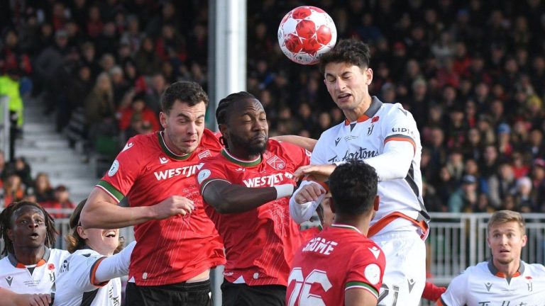 Forge FC's Alessandro Hojabrpour, right, rises to head the ball during first half soccer action in the Canadian Premier League Final in Calgary on Saturday, November 9, 2024. (Stuart Gradon/CP Photo)
