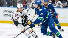 Canucks spoil Bedard&#8217;s homecoming, beat Blackhawks