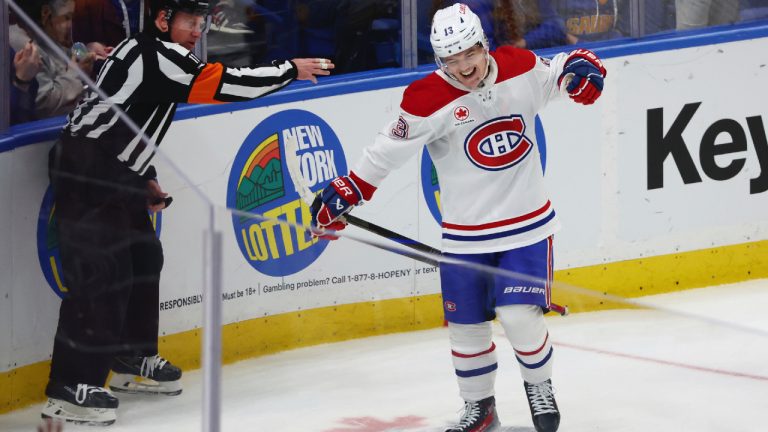 Montreal Canadiens right wing Cole Caufield (13) celebrates his game winning goal during the third period of an NHL hockey game against the Buffalo Sabres, Monday, Nov. 11, 2024, in Buffalo, N.Y. (Jeffrey T. Barnes/AP)