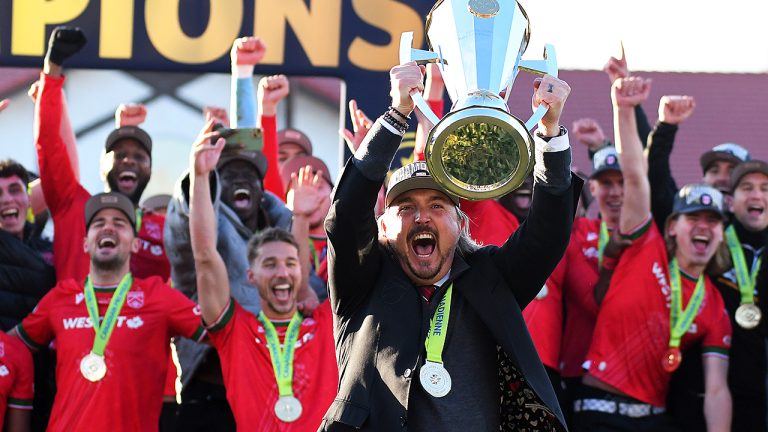 Cavalry FC head coach Tommy Wheeldon Jr. lifts the North Star Cup after his team defeated Forge FC in the 2024 Canadian Premier League Final. (Stuart Gradon/CP)