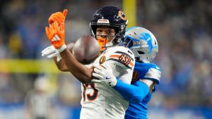 Chicago Bears wide receiver Rome Odunze (15) can't catch a pass as Detroit Lions cornerback Terrion Arnold (0) defends during the second half of an NFL football game in Detroit, Thursday, Nov. 28, 2024. (Carlos Osorio/AP)