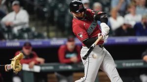 Arizona Diamondbacks' Christian Walker grounds out against Colorado Rockies starting pitcher Ryan Feltner to end the top of the third inning of a game, Tuesday, Sept. 17, 2024, in Denver. (AP/David Zalubowski)