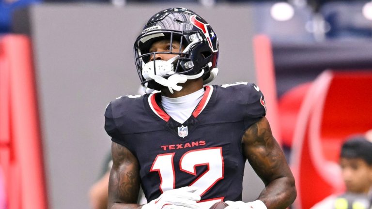 Houston Texans wide receiver Nico Collins warms up. (Maria Lysaker/AP)