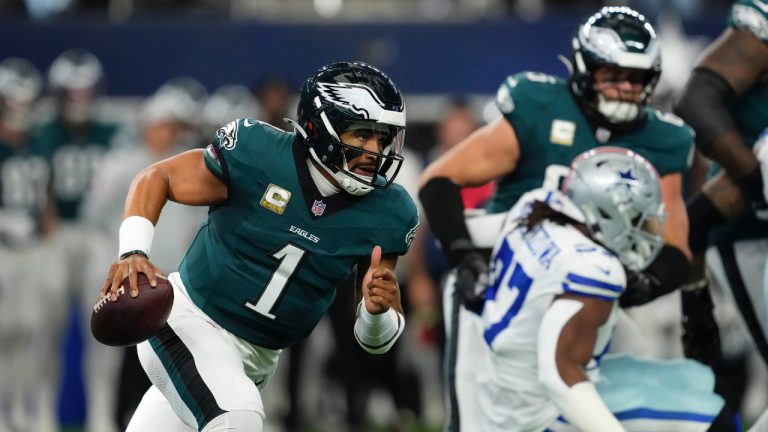 Philadelphia Eagles quarterback Jalen Hurts scrambles out of the pocket in the first half of an NFL football game against the Dallas Cowboys in Arlington, Texas, Sunday, Nov. 10, 2024. (Jeffrey McWhorter/AP)