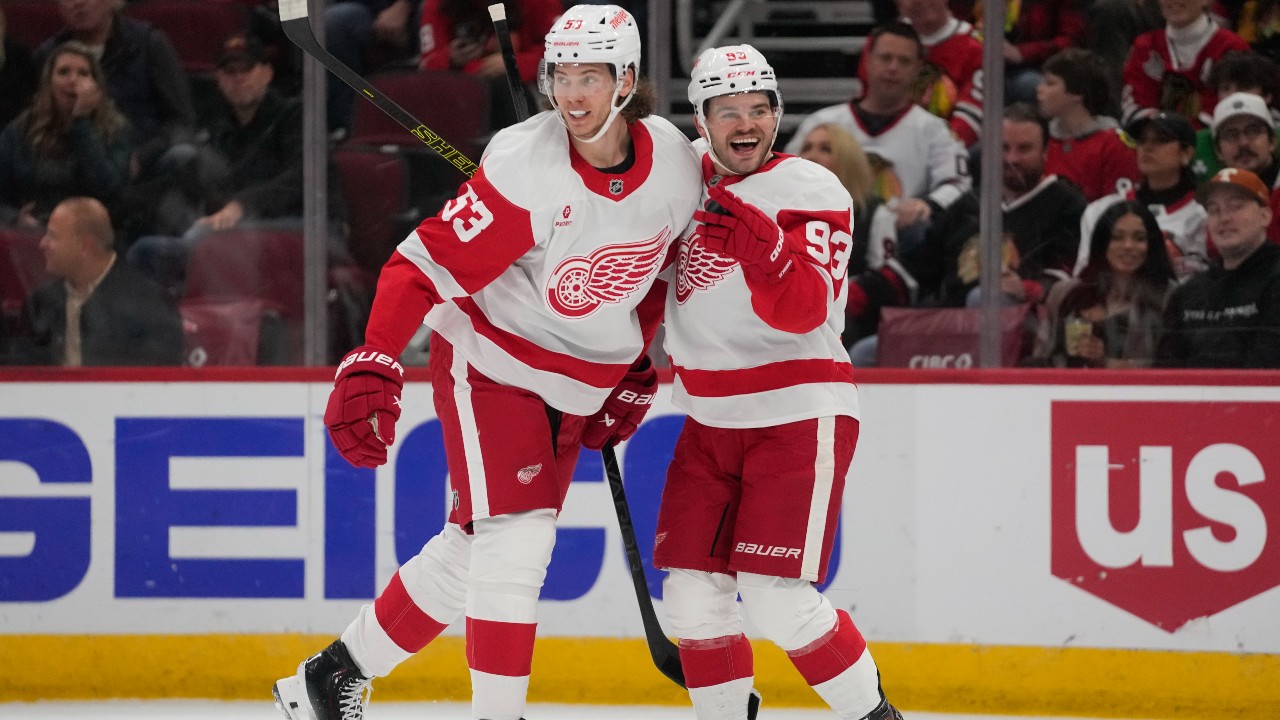 Larkin, DeBrincat lead Red Wings to win over Blackhawks