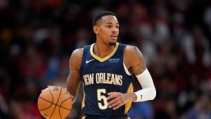 New Orleans Pelicans guard Dejounte Murray (5) dribbles against the Houston Rockets during the second half of an NBA preseason basketball game Tuesday, Oct. 15, 2024, in Houston. (Eric Christian Smith/AP)