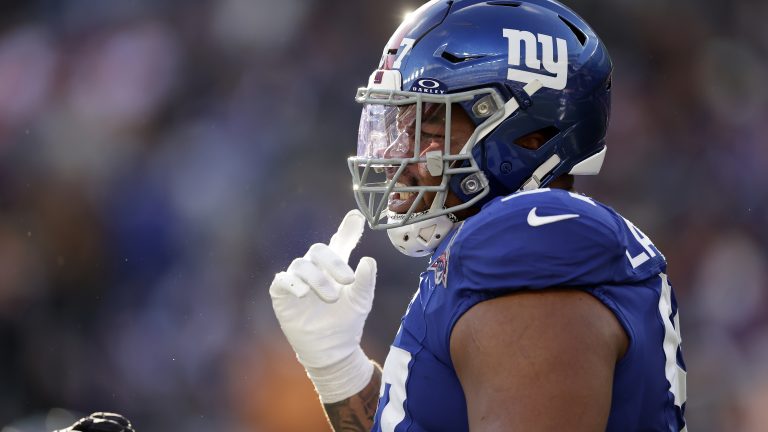 New York Giants defensive tackle Dexter Lawrence II (97) reacts during an NFL football game. (Adam Hunger/AP)