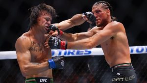 Diego Lopes, left, fights Brian Ortega in a featherweight bout during UFC 306 at the Sphere, Saturday, Sept. 14, 2024, in Las Vegas. (Wade Vandervort/Las Vegas Sun via AP)