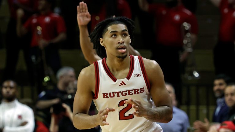 Rutgers guard Dylan Harper (2) reacts after making a three-point basket during the first half of an NCAA college basketball game against Wagner Wednesday, Nov. 6, 2024, in Piscataway, N.J. (AP Photo/Adam Hunger)