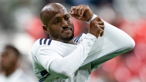 Vancouver Whitecaps' Fafa Picault, undresses after receiving a red card during the second half of an MLS soccer match against the Seattle Sounders in Vancouver, on Wednesday, October 2, 2024. (Ethan Cairns/CP)