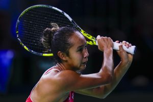 Canada's Leylah Fernandez returns the ball against Katie Boulter, of Britain, during the Billie Jean King Cup Finals at Martin Carpena Sports Hall in Malaga, southern Spain, Sunday, Nov. 17, 2024. (Manu Fernandez/AP)