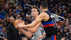 Orlando Magic forward Franz Wagner, left, drives to the basket against Detroit Pistons forward Simone Fontecchio, right, during the second half of an NBA game, Saturday, Nov. 23, 2024, in Orlando, Fla. (AP/John Raoux)