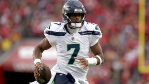 Seattle Seahawks quarterback Geno Smith (7) runs for a touchdown in the fourth quarter during an NFL football game against the San Francisco 49ers, Sunday, November 17, 2024, in Santa Clara, Calif. (AP Photo/Scot Tucker)