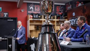 Canadian Football League commissioner Randy Ambrosie, left, announces that Calgary will host the 2026 Grey Cup, in Calgary, Alta., Friday, Nov. 8, 2024. (CP/Jeff McIntosh)