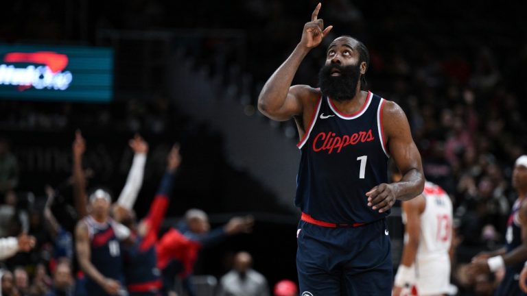 Los Angeles Clippers guard James Harden (1) gestures after making a three point basket during the second half of an NBA basketball game against the Washington Wizards, Wednesday, Nov. 27, 2024, in Washington. (AP Photo/Terrance Williams)