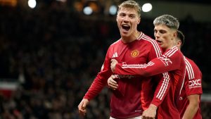 Manchester United's Rasmus Hojlund celebrates after scoring his side's second goal during the Europa League opening phase soccer match between Manchester United and Bodo Glimt, at the Old Trafford stadium. (Dave Thompson/AP)